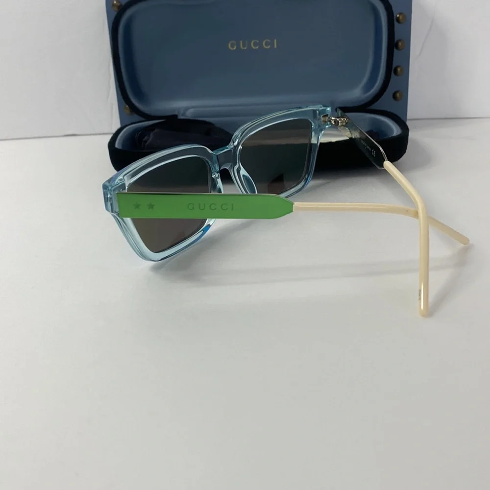 Gucci GG0975S 003 Men’s Translucent Square Sunglasses in Light Blue